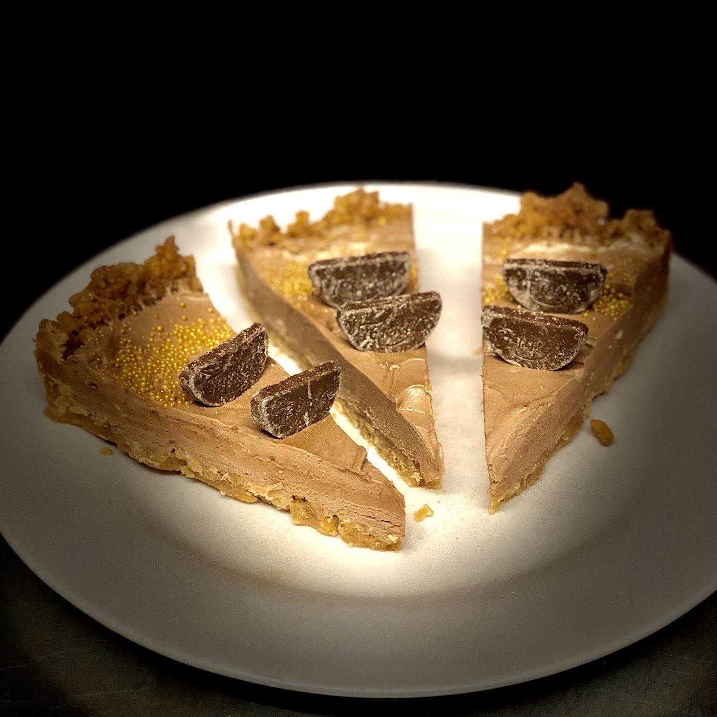 Slices of tart topped with chocolate pieces