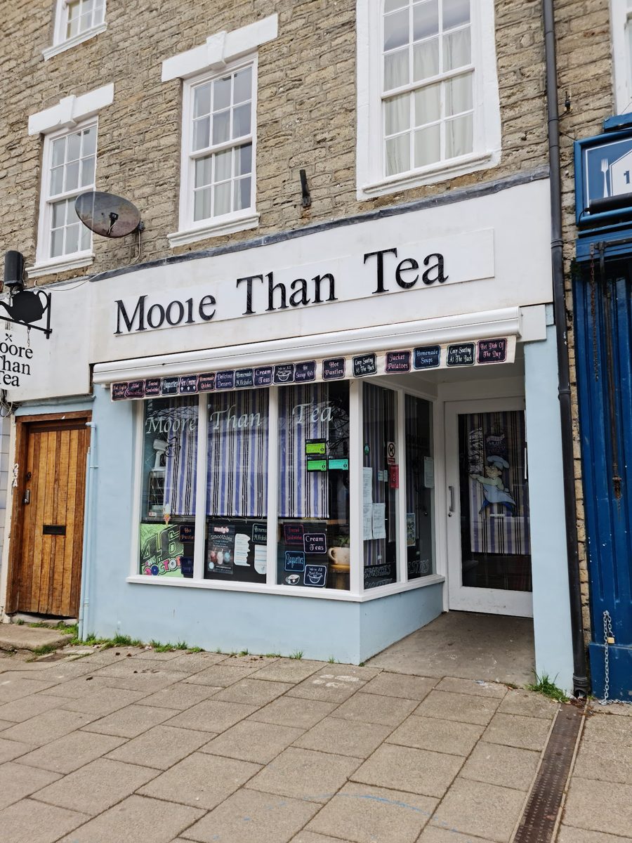 The white shopfront with the Moore Than Tea sign on West Street